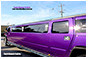 Stretch Purple Hummer Limo chauffeured vehicle from Showtime Limos